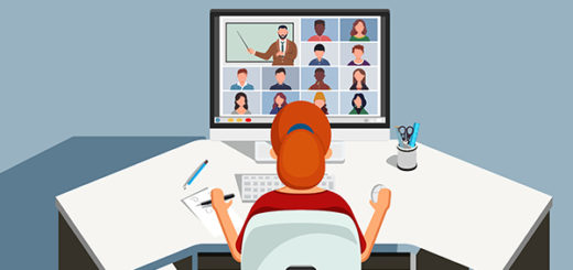 A student sits at a desk, watching a webinar