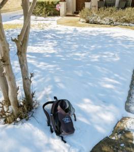 Scott’s Sasky Pack lying in the snow in front of his house