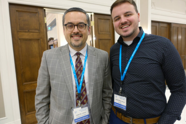 Josip Zic and Justin Dileo. Two men stand next to each other and smiling at the camera.